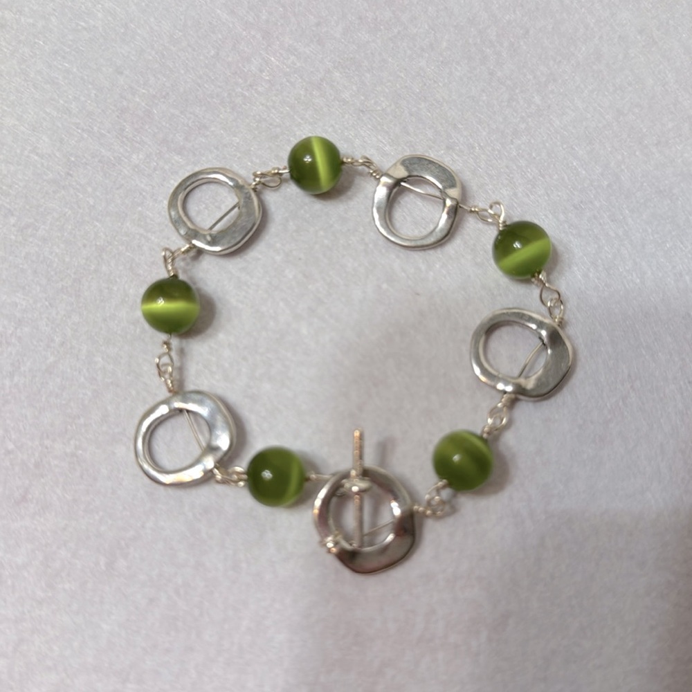 Hand made wrapped bracelet. Good condition.